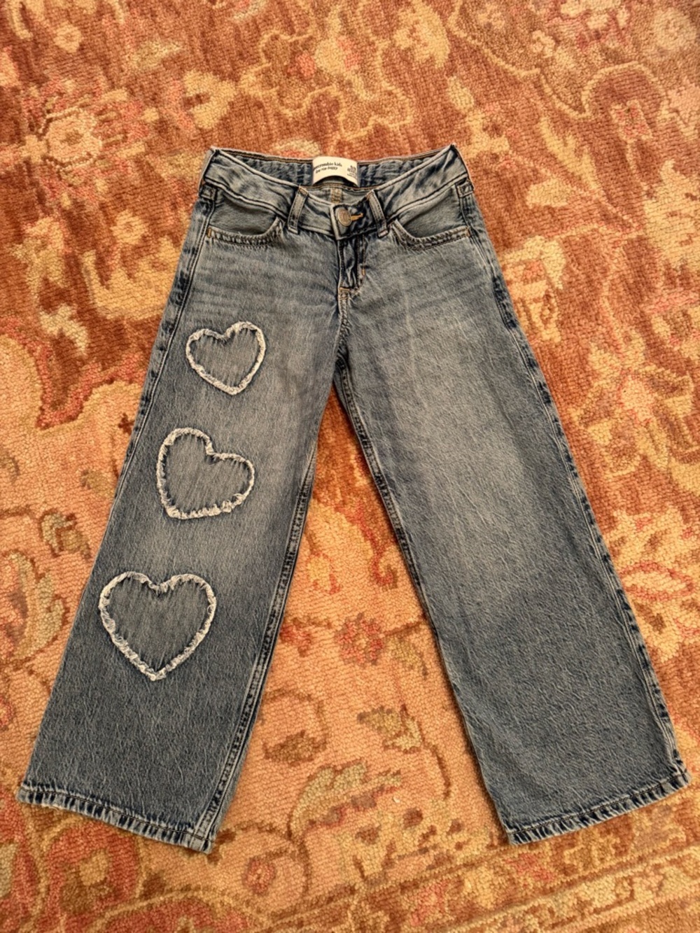 abercrombie kids blue wide-leg jeans with heart patches
